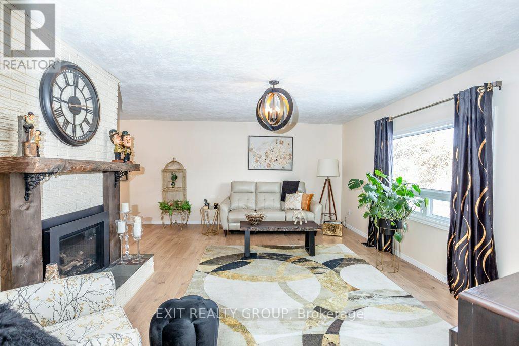 640 Victoria Street N, Tweed (Hungerford (Twp)), ON - Indoor Photo Showing Living Room With Fireplace