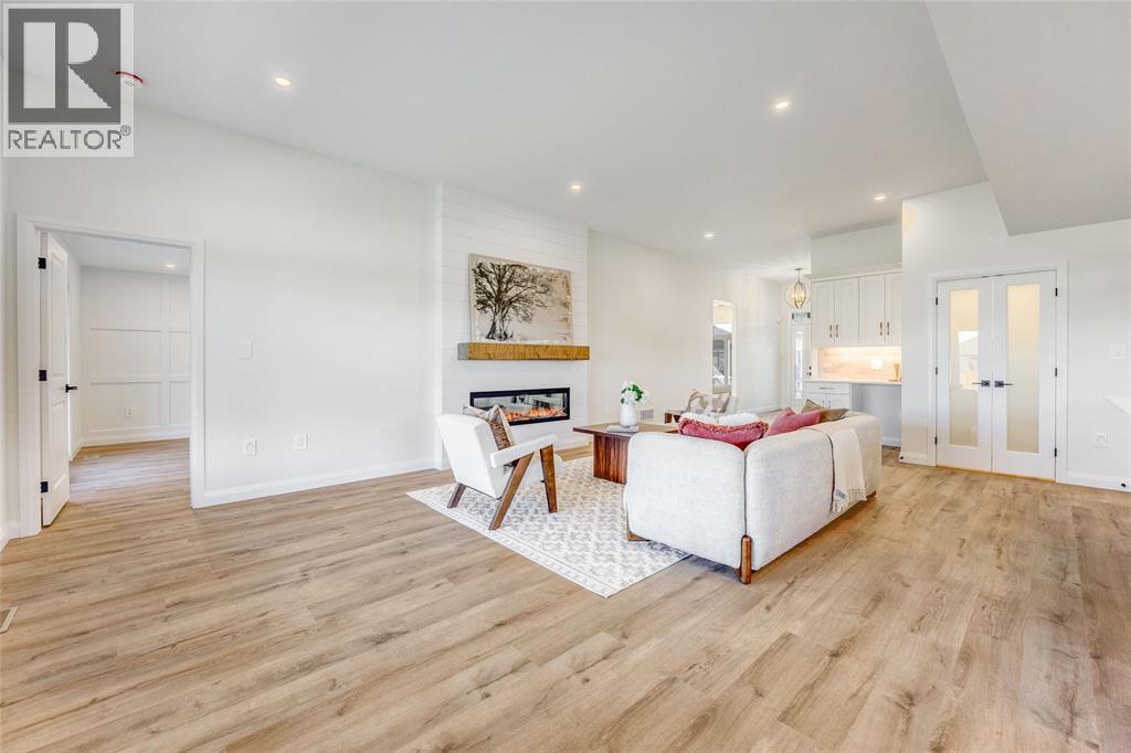 3515 Mia Lane, Plympton-Wyoming, ON - Indoor Photo Showing Living Room With Fireplace
