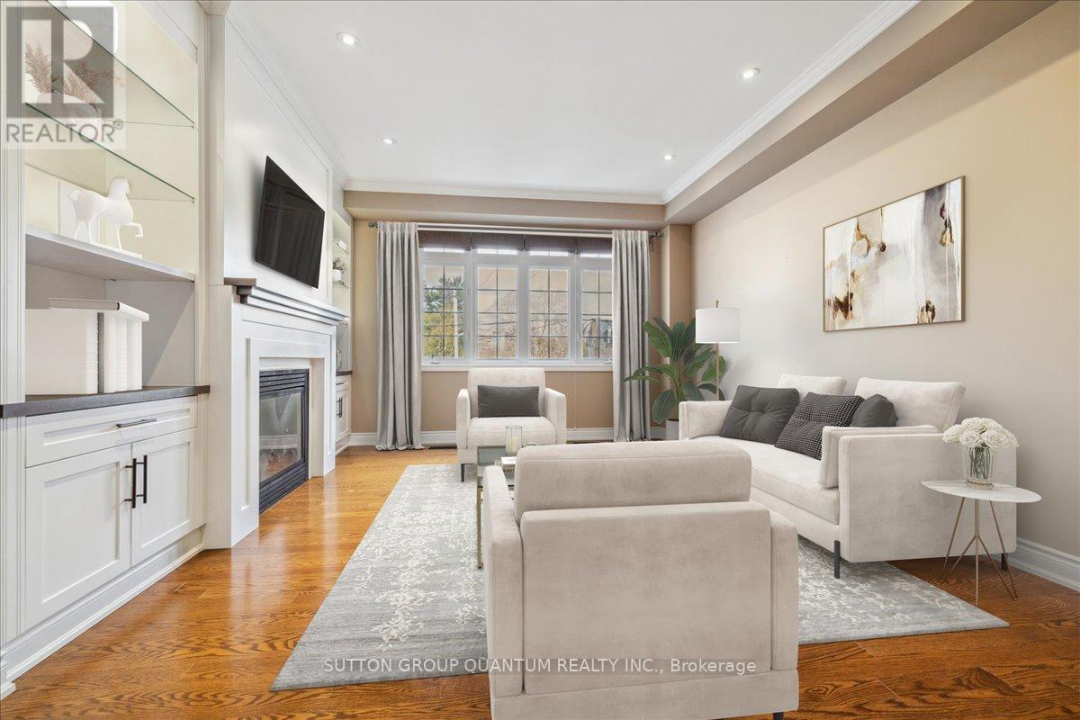 Photo has been digitally staged. - 32 Harborn Road, Mississauga, ON - Indoor Photo Showing Living Room With Fireplace