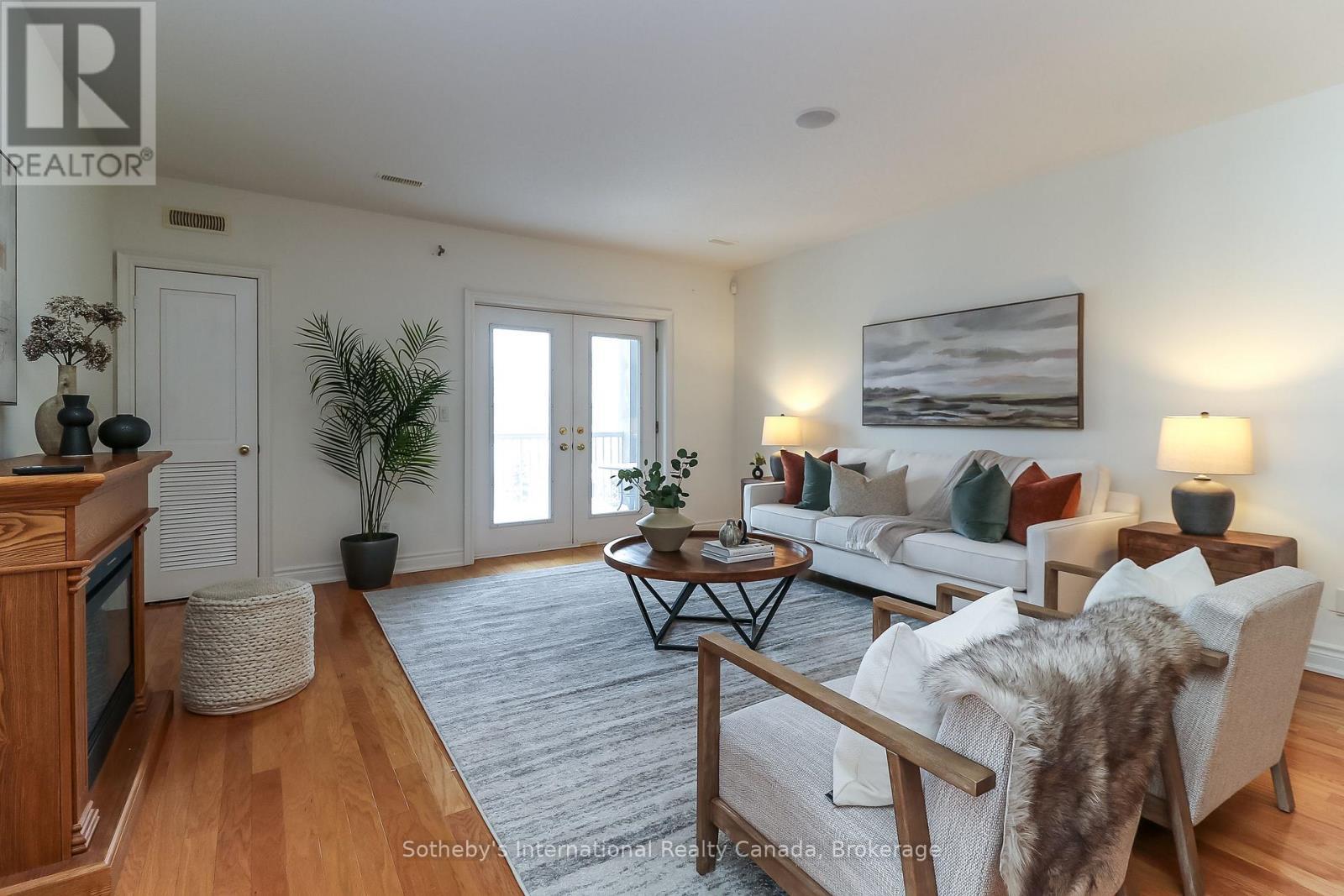308 - 25 Beaver Street S, Blue Mountains, ON - Indoor Photo Showing Living Room