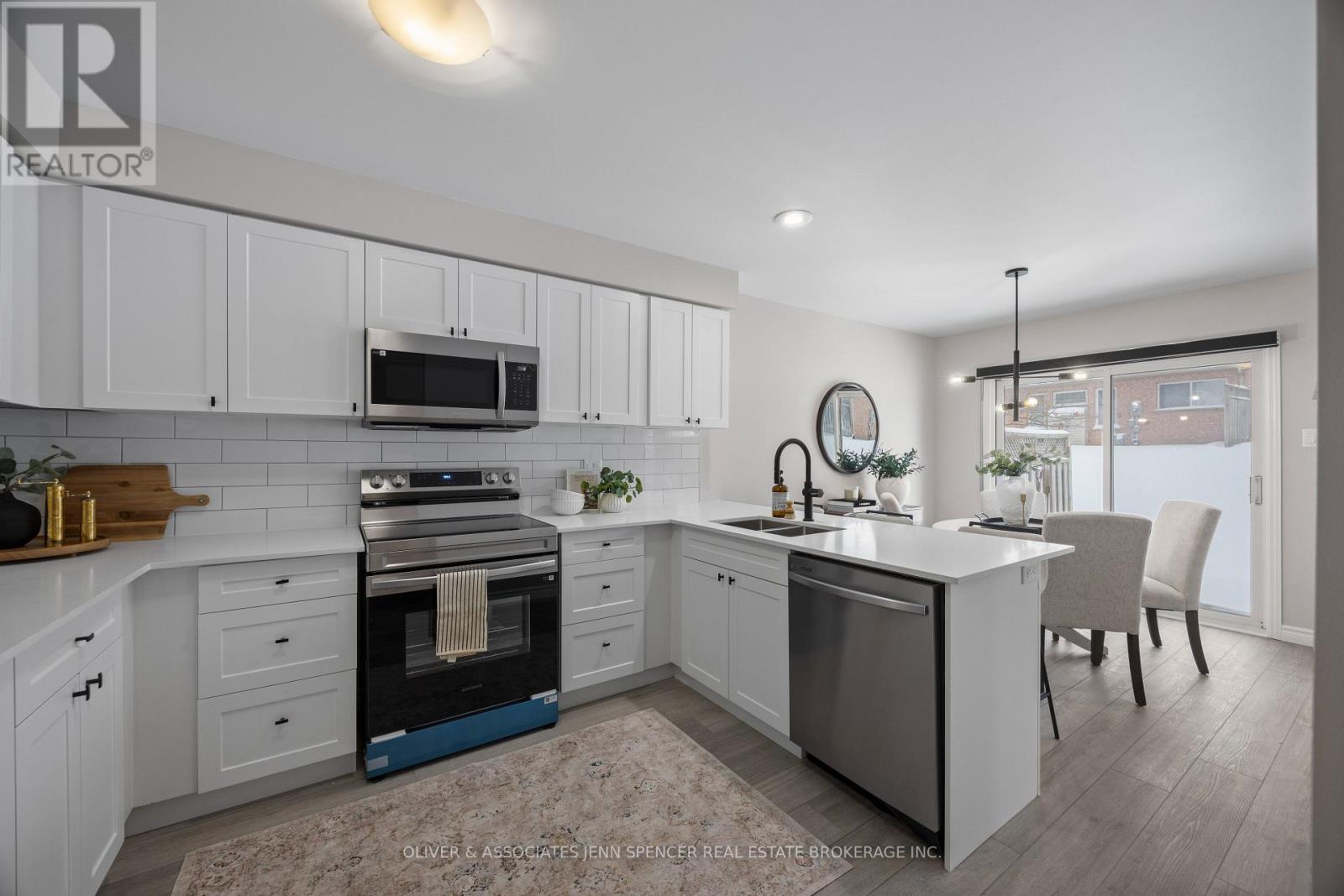 66 - 601 Grenfell Drive, London North (North C), ON - Indoor Photo Showing Kitchen With Double Sink