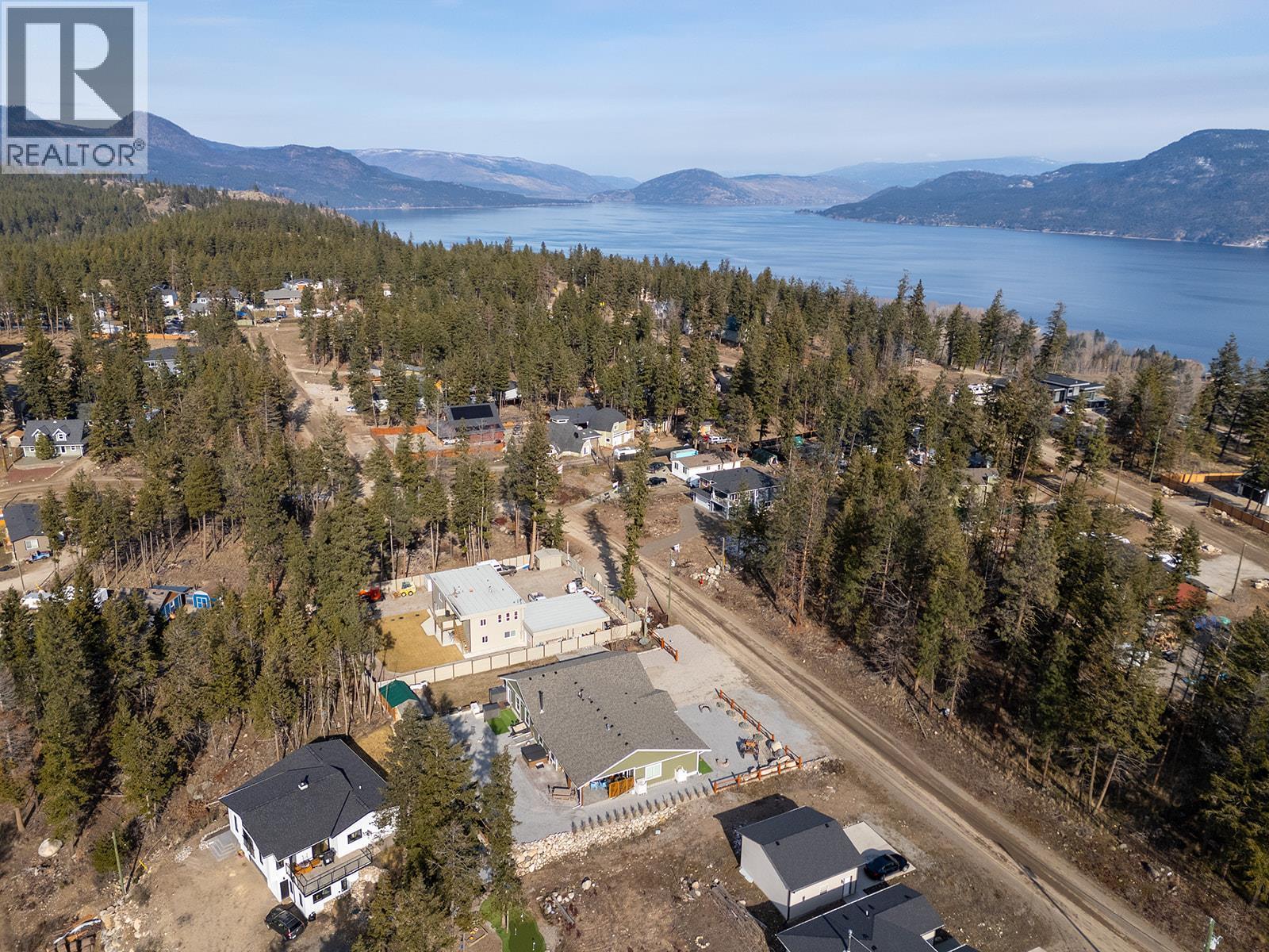 7145 Dunwaters Road, Kelowna, BC - Outdoor With Body Of Water With View