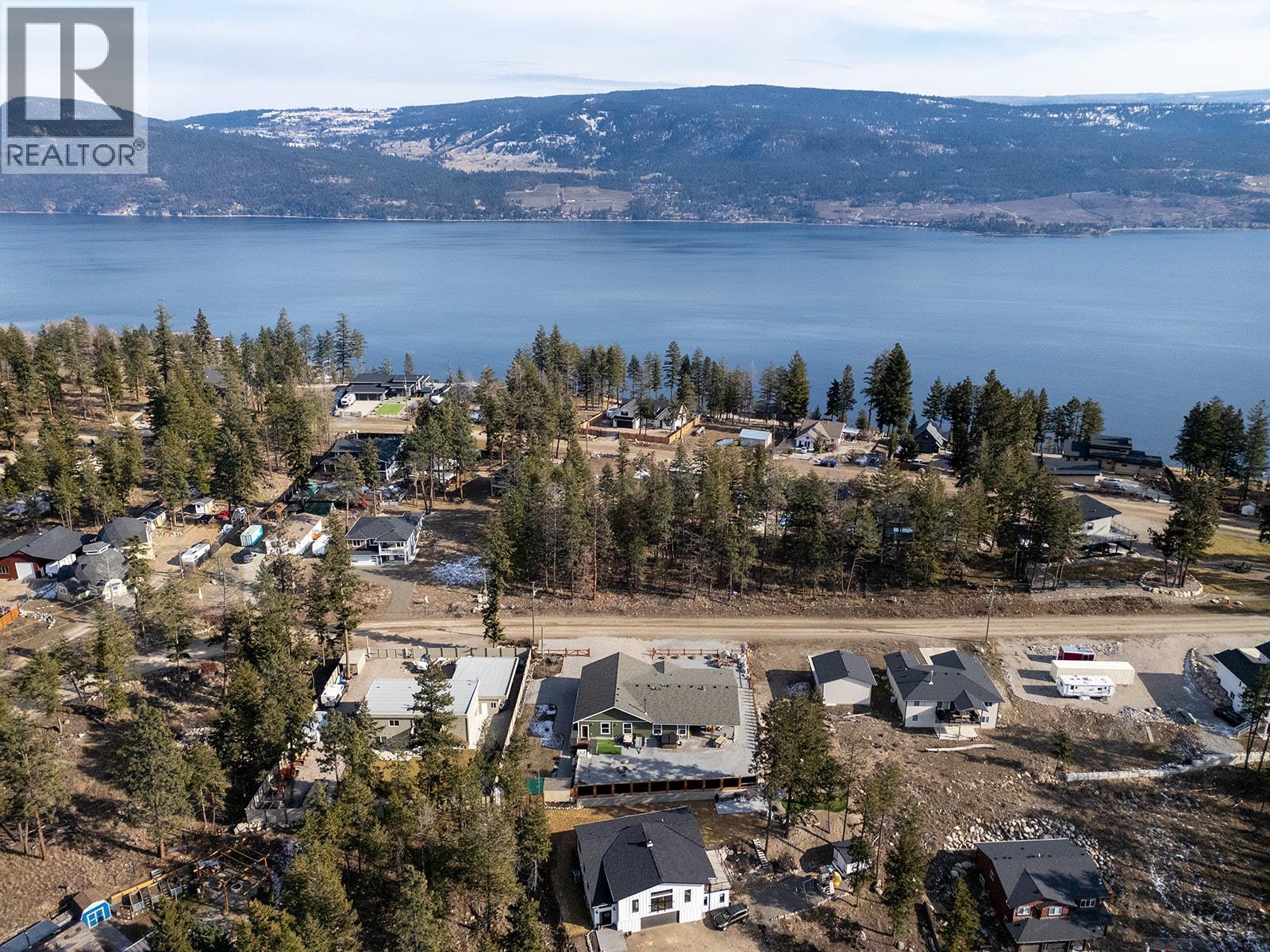 7145 Dunwaters Road, Kelowna, BC - Outdoor With Body Of Water With View