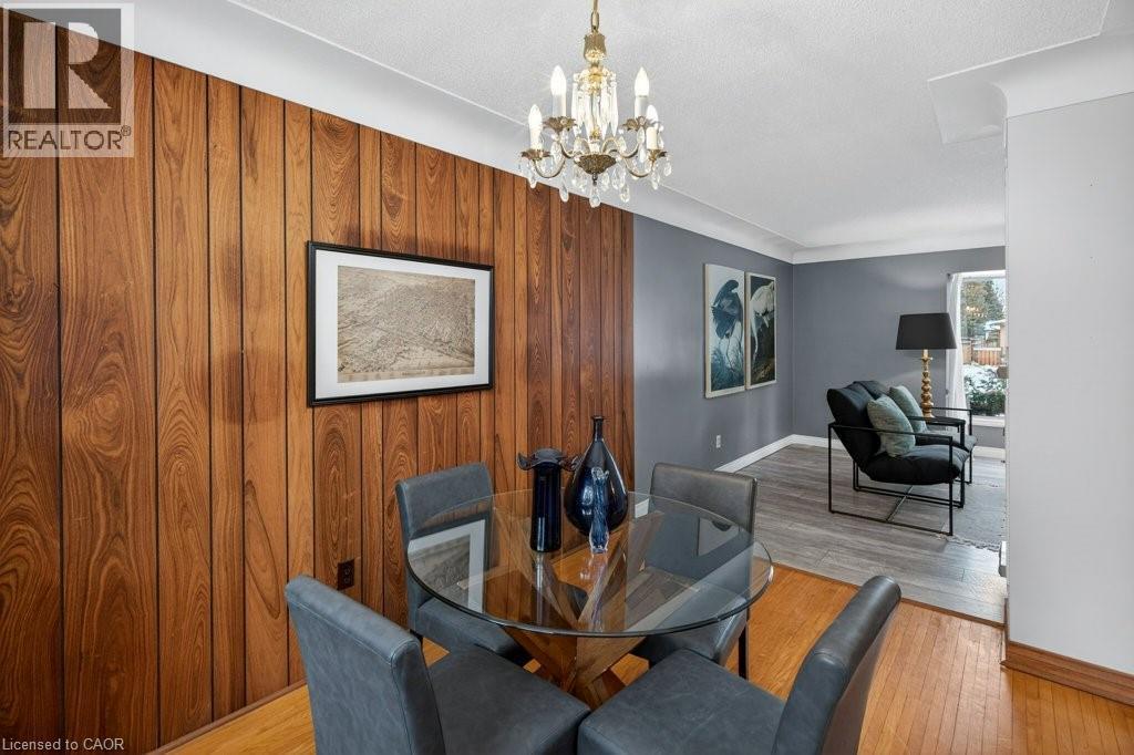 324 Woodworth Drive W, Ancaster, ON - Indoor Photo Showing Dining Room With Fireplace