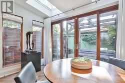 Sun-filled windows & skylights overlooking garden -