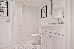 Renovated 3-piece bath with glass shower -