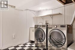 Laundry with full size appliances & mechanicals -