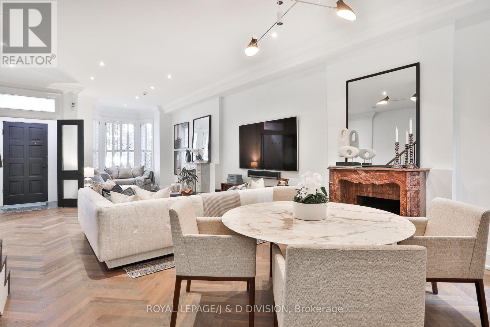 Elegant living, dining & bay window seating - 69 Sullivan Street, Toronto, ON - Indoor Photo Showing Other Room