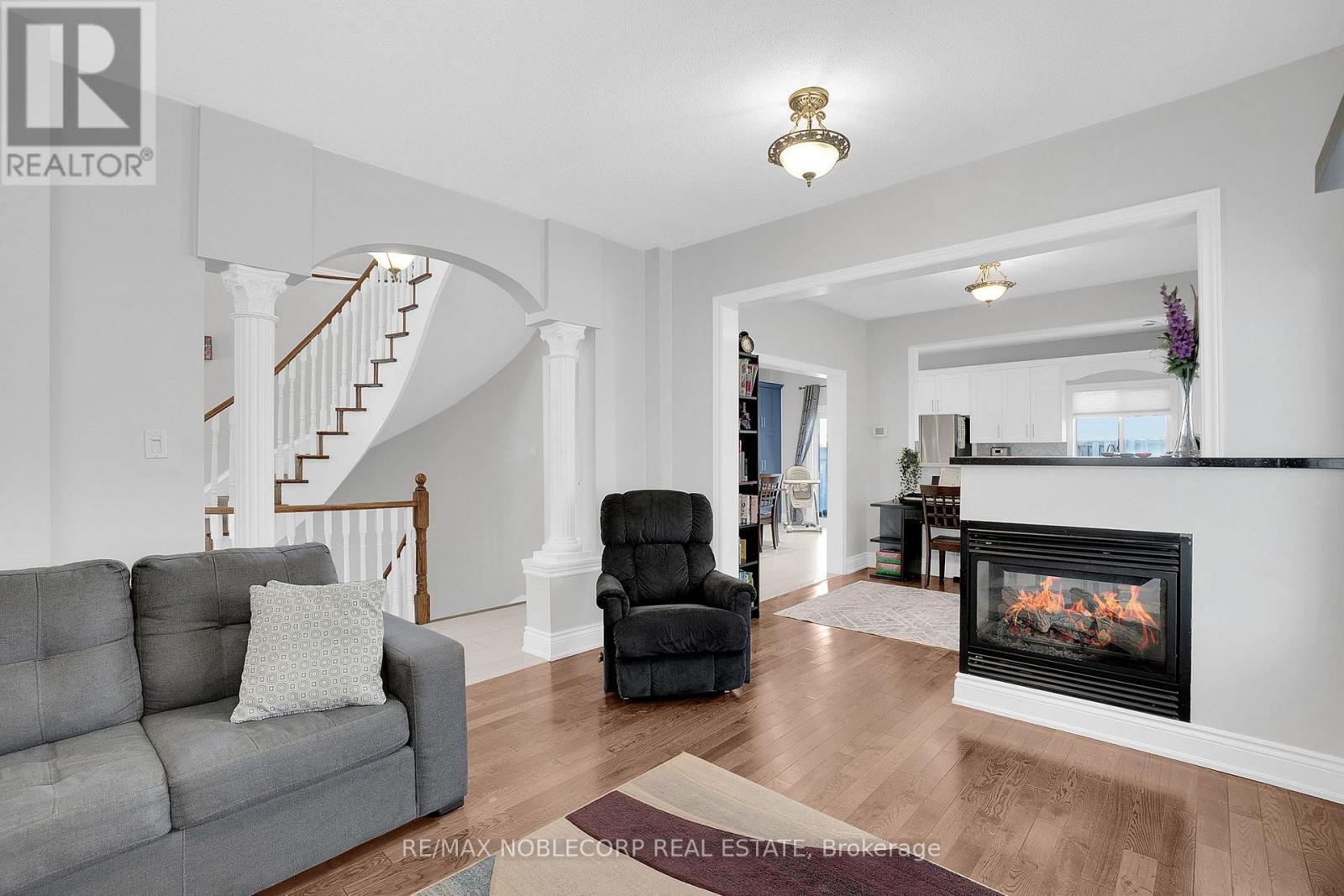 92 Water Garden Lane, Vaughan, ON - Indoor Photo Showing Living Room With Fireplace