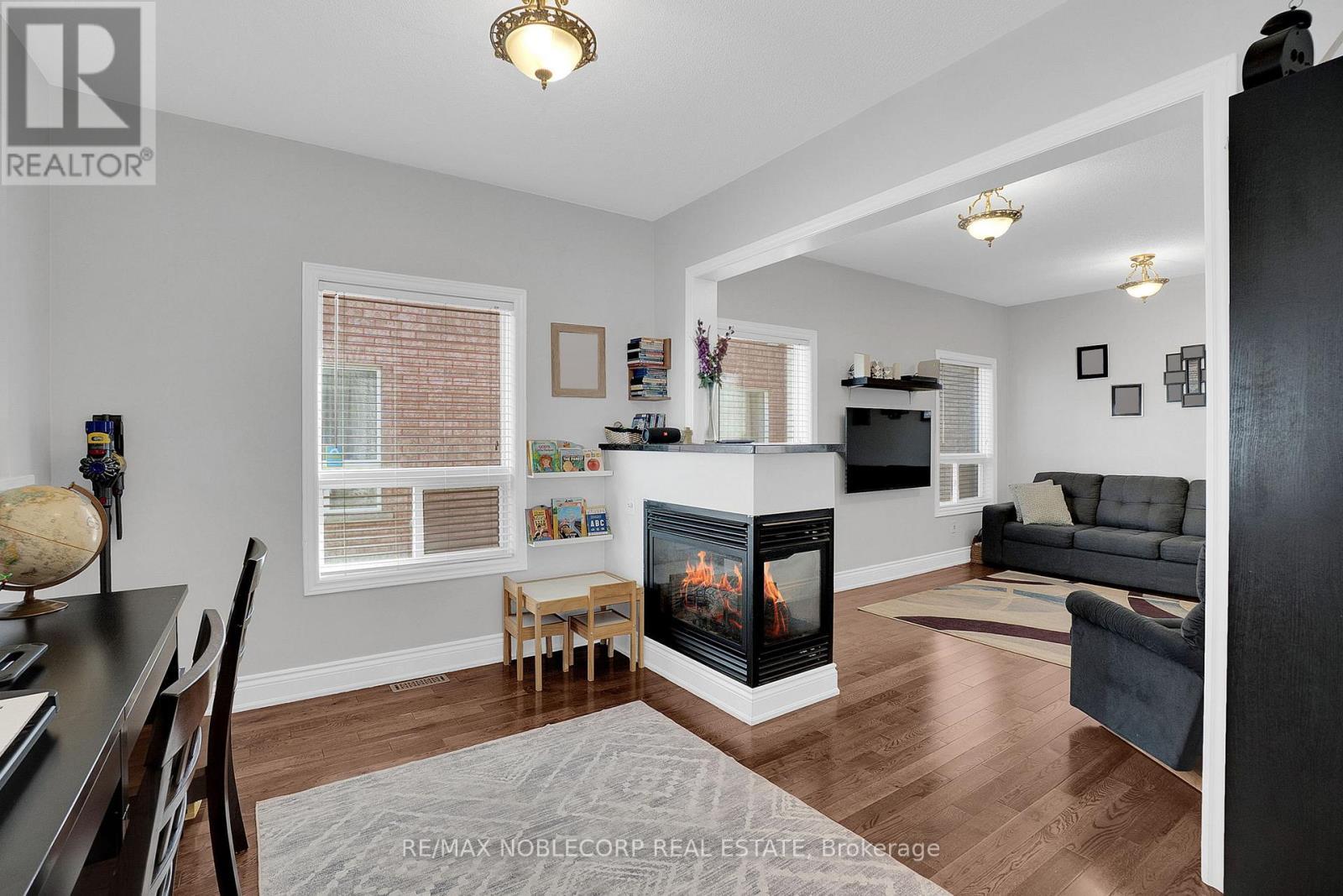92 Water Garden Lane, Vaughan, ON - Indoor Photo Showing Living Room With Fireplace