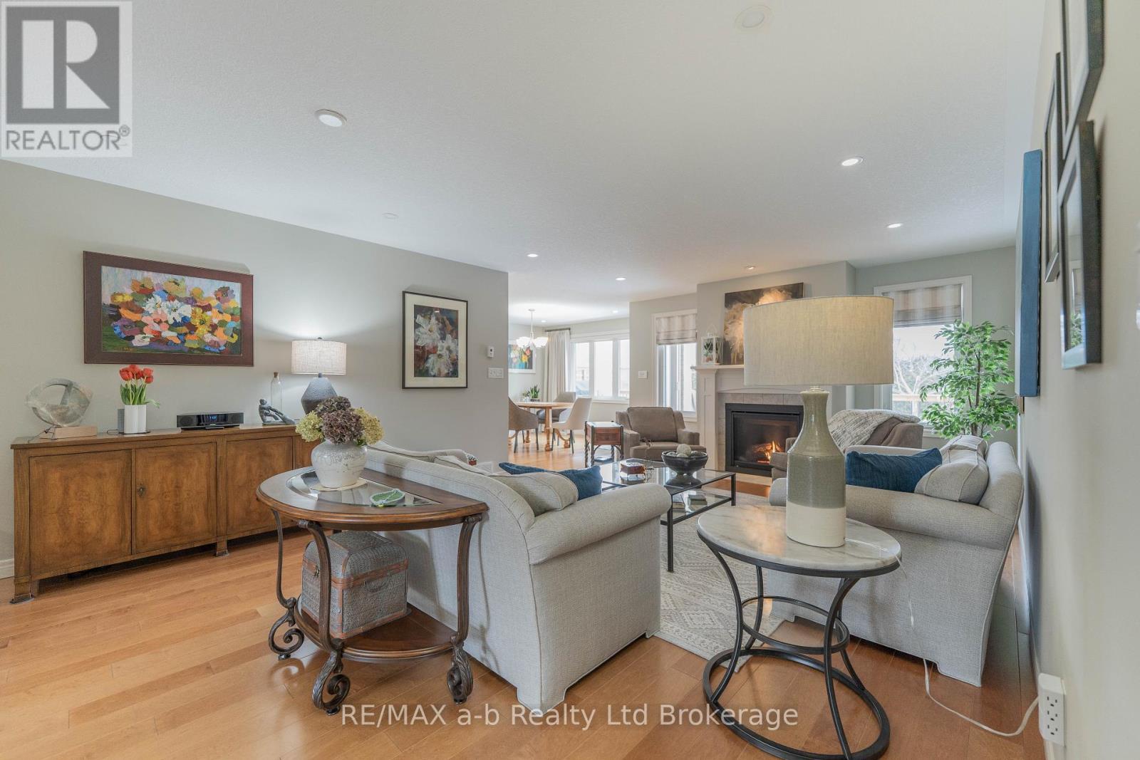 Open Concept from Living Room - 11 Hollier Drive, Tillsonburg, ON - Indoor Photo Showing Living Room With Fireplace