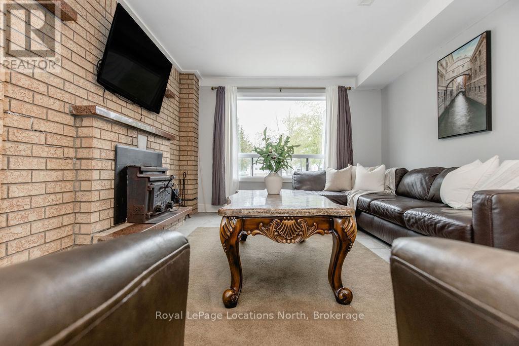 3 51St Street, Wasaga Beach, ON - Indoor Photo Showing Living Room With Fireplace