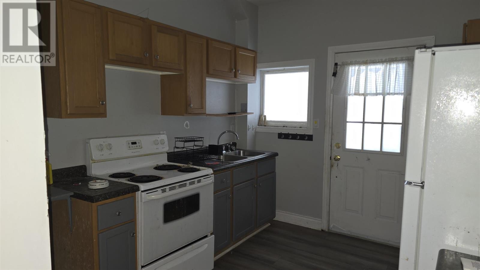 153 Church St, Sault Ste. Marie, ON - Indoor Photo Showing Kitchen With Double Sink