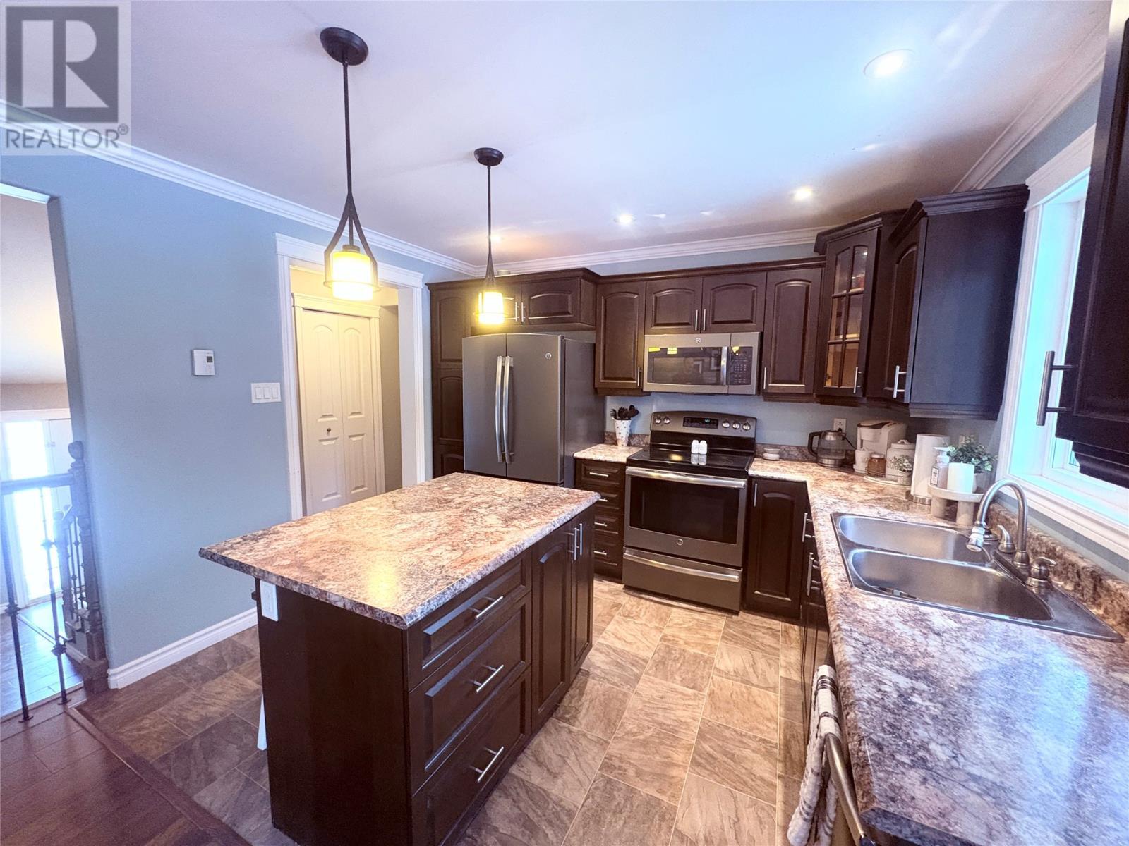 9 Comfort Cove Road, Campbellton, NL - Indoor Photo Showing Kitchen With Double Sink With Upgraded Kitchen