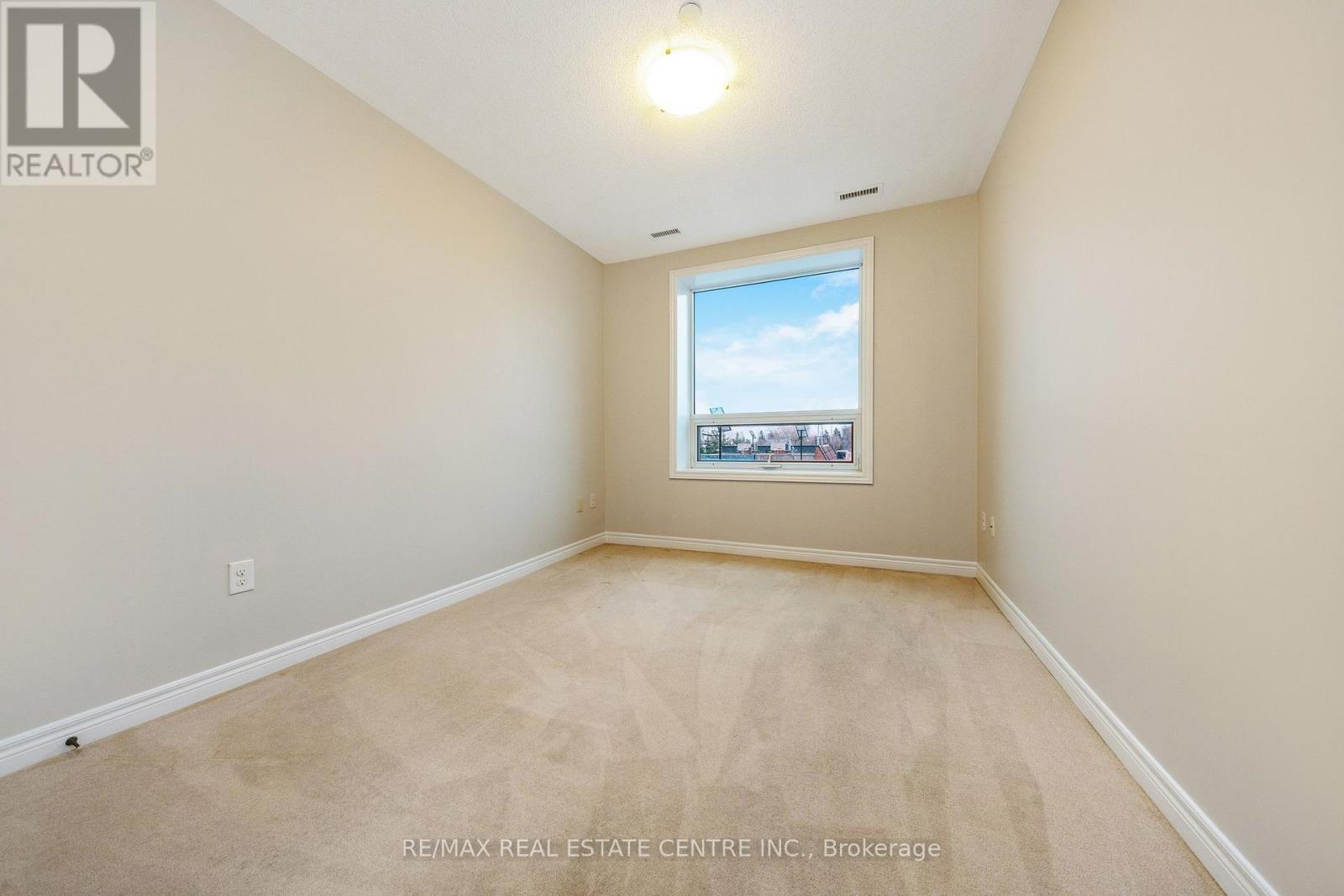 216 - 383 Main Street E, Milton, ON - Indoor Photo Showing Other Room