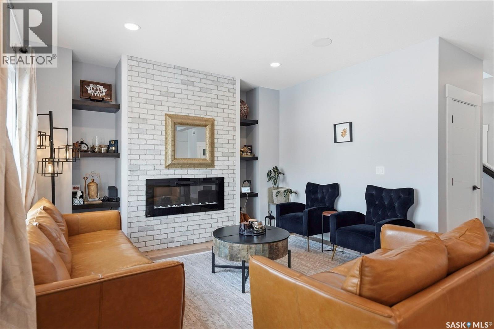 534 Bolstad Turn, Saskatoon, SK - Indoor Photo Showing Living Room With Fireplace