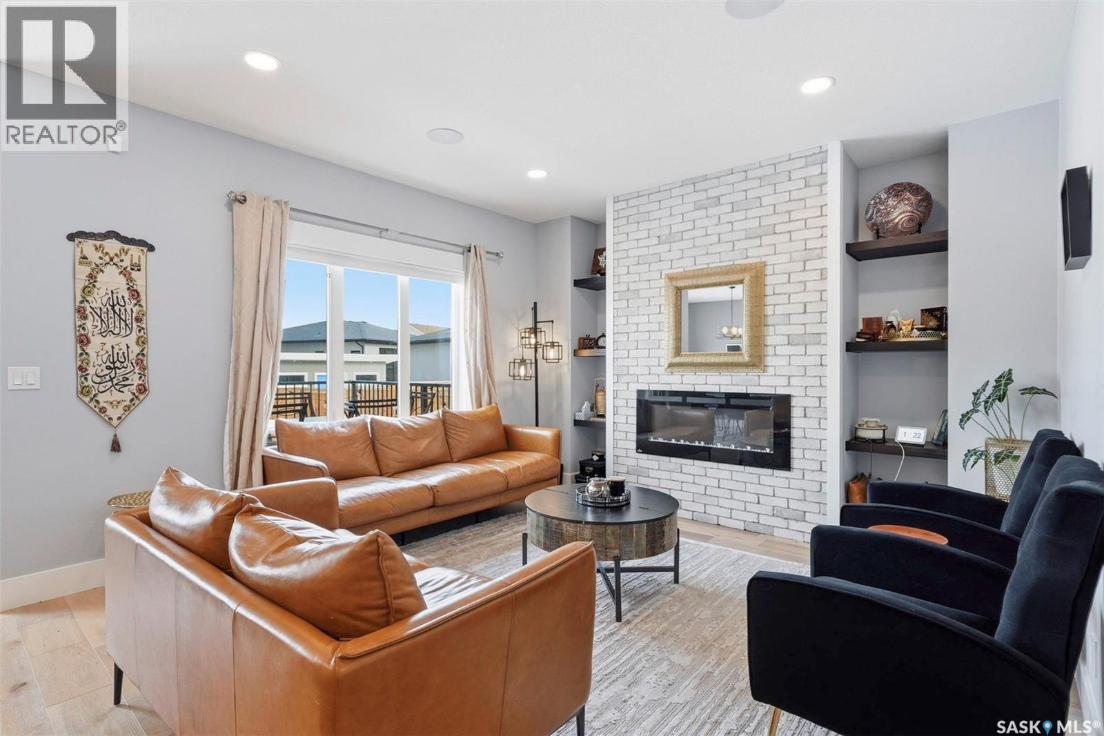 534 Bolstad Turn, Saskatoon, SK - Indoor Photo Showing Living Room With Fireplace