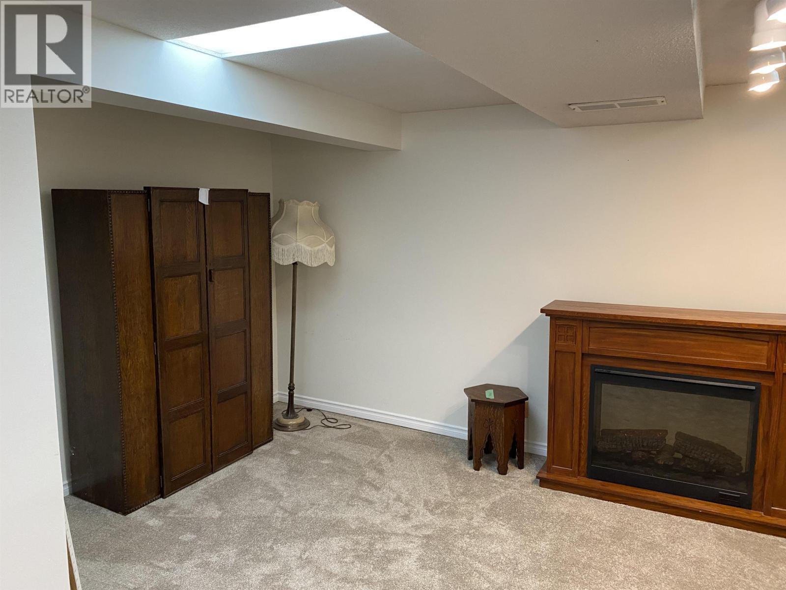 125 15Th Avenue, Prince George, BC - Indoor With Fireplace