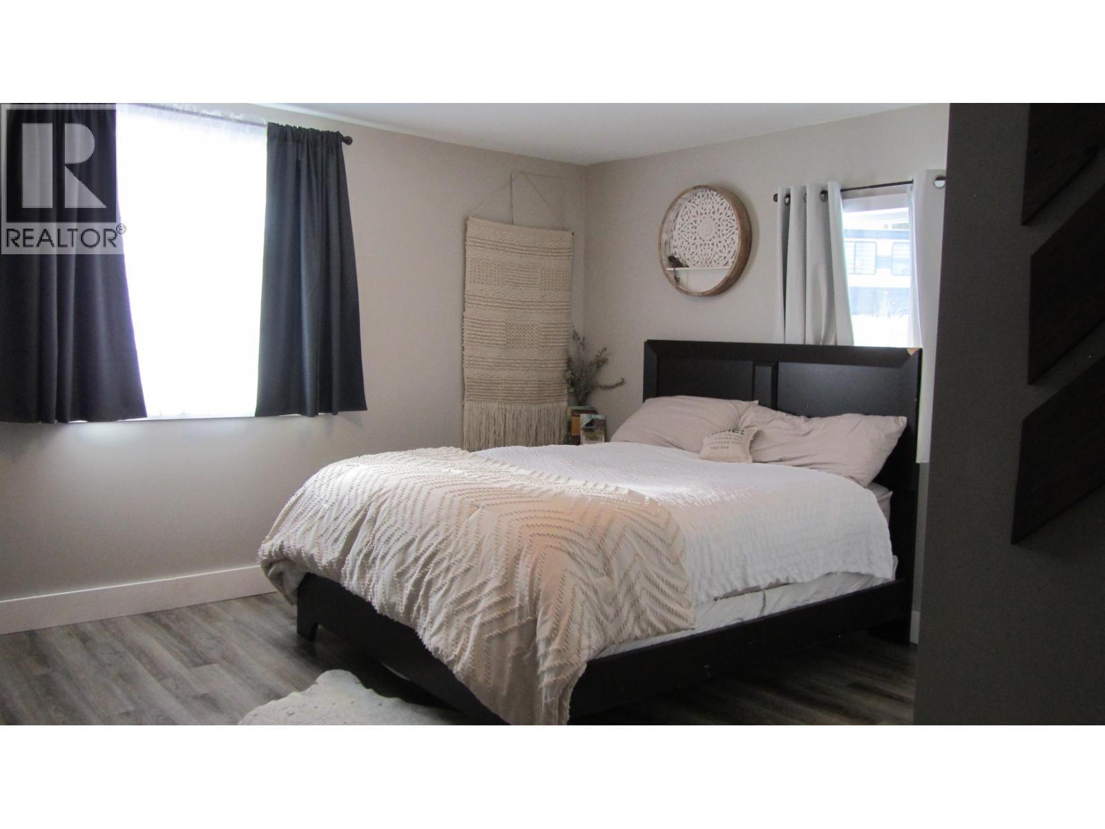 6313 Archie Meadow Road, Forest Grove, BC - Indoor Photo Showing Bedroom