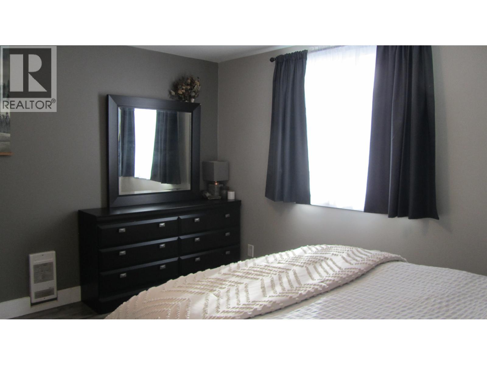 6313 Archie Meadow Road, Forest Grove, BC - Indoor Photo Showing Bedroom