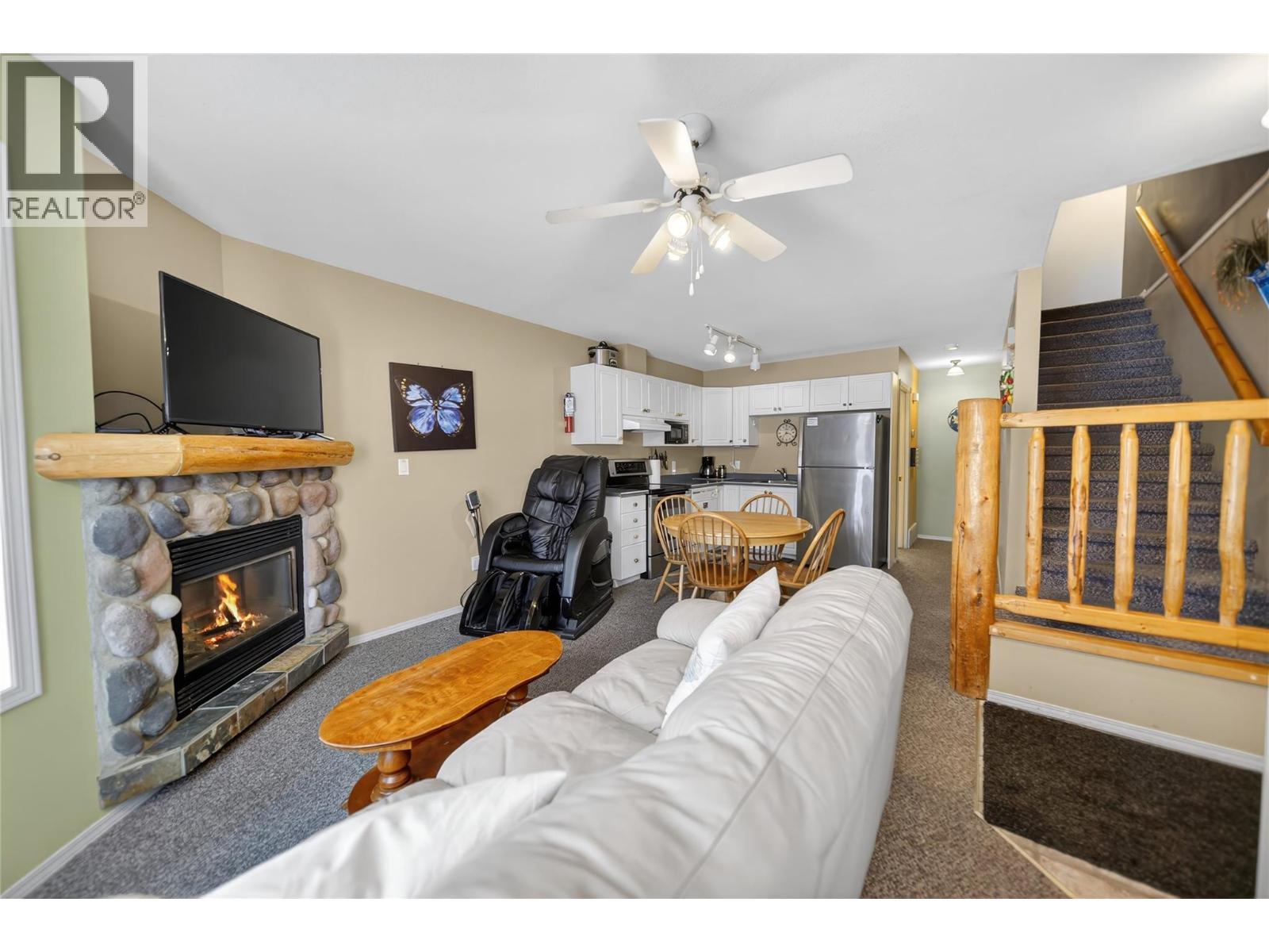 400 Riverside Way Unit# 438, Fernie, BC - Indoor Photo Showing Living Room With Fireplace