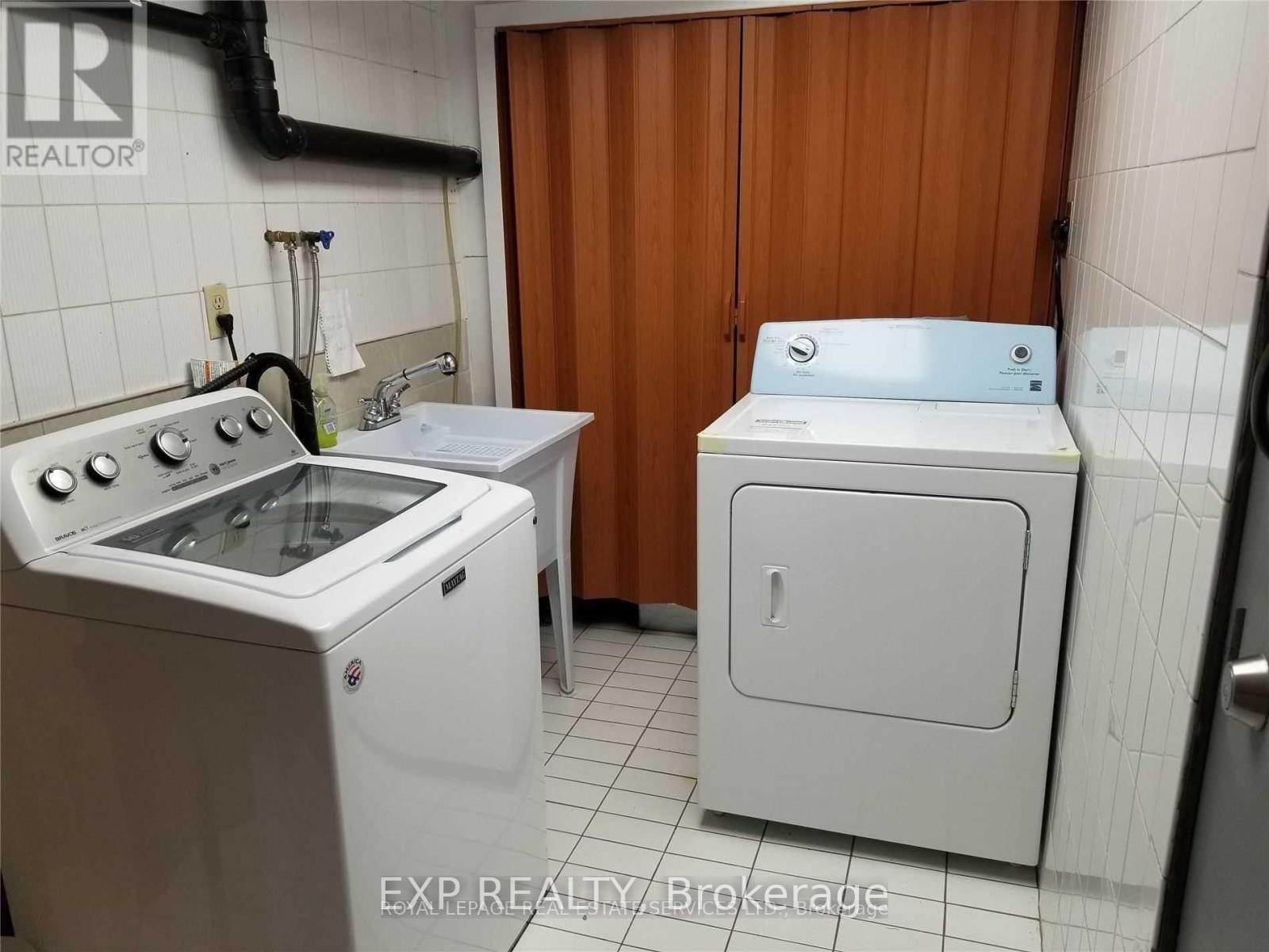 Upper - 33 Mitchell Avenue, Toronto, ON - Indoor Photo Showing Laundry Room
