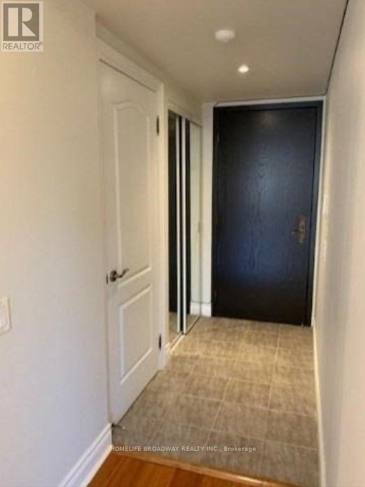 Unit Corridor with Mirrored Coat Closet - 315 - 2 Clairtrell Road, Toronto, ON - Indoor Photo Showing Other Room