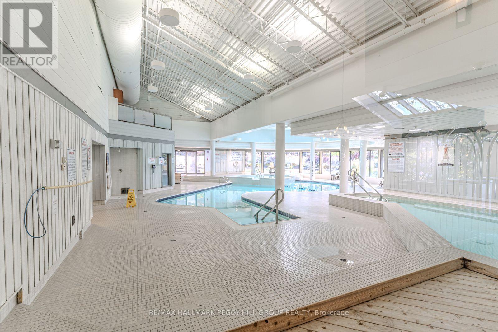 217 - 40 Horseshoe Boulevard, Oro-Medonte, ON - Indoor Photo Showing Other Room With In Ground Pool