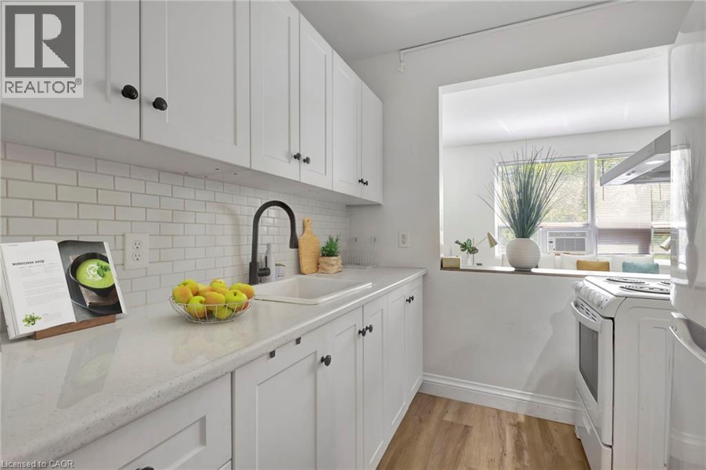 Virtually Stagged - 37 Mericourt Road Unit# 304, Hamilton, ON - Indoor Photo Showing Kitchen