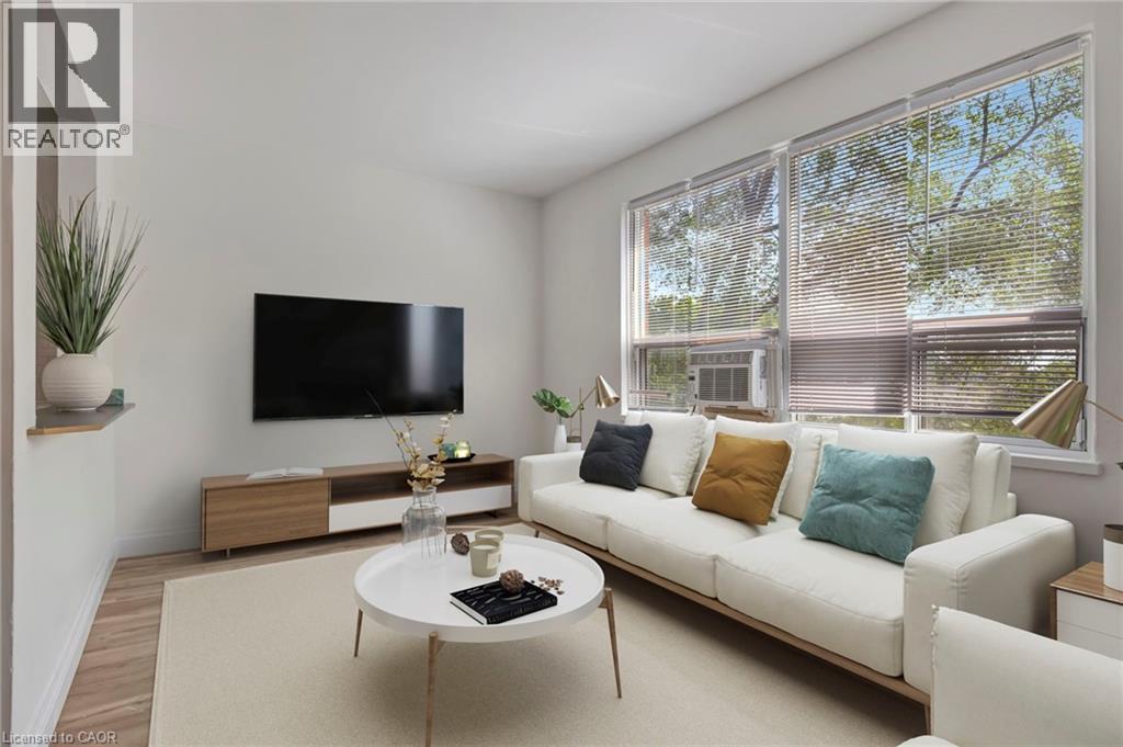 Virtually Stagged - 37 Mericourt Road Unit# 304, Hamilton, ON - Indoor Photo Showing Living Room