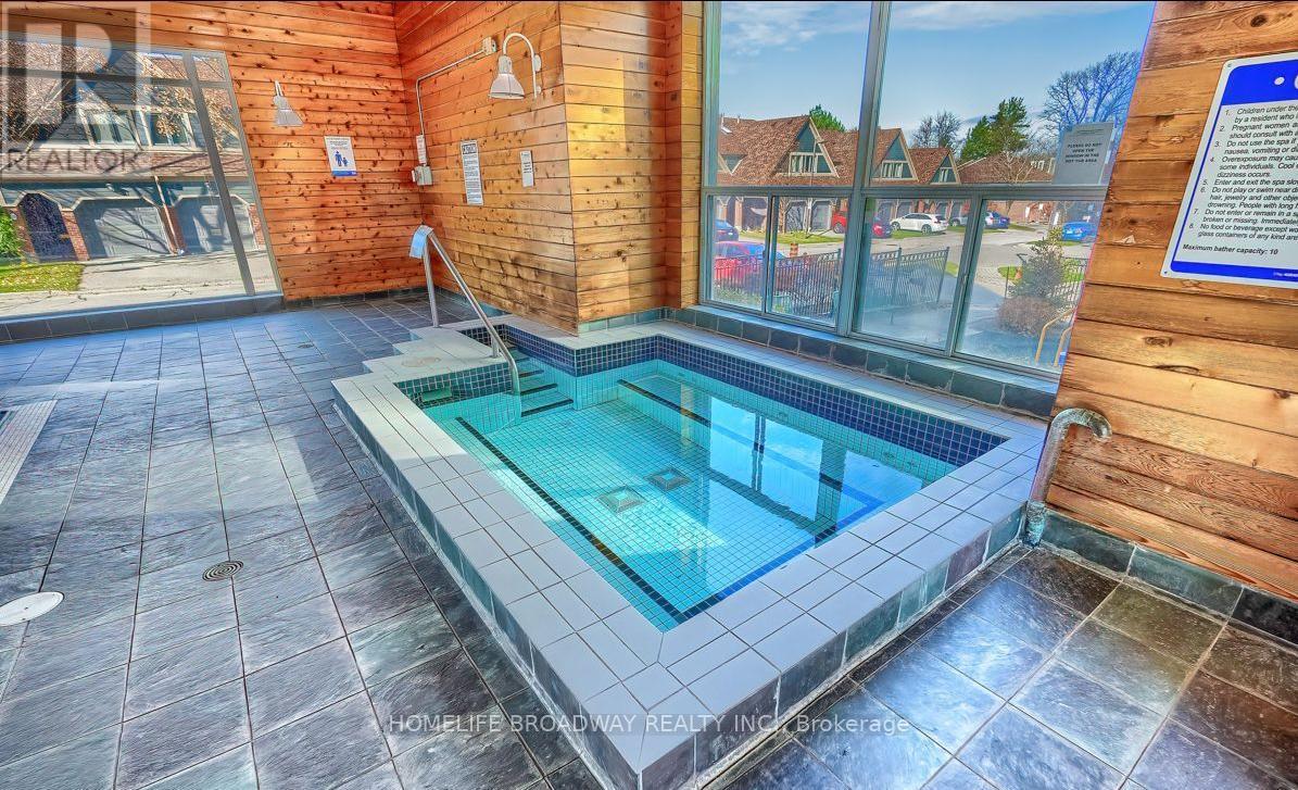 Indoor hot tub - 1709 - 2155 Burnhamthorpe Road W, Mississauga, ON - Indoor Photo Showing Other Room With In Ground Pool