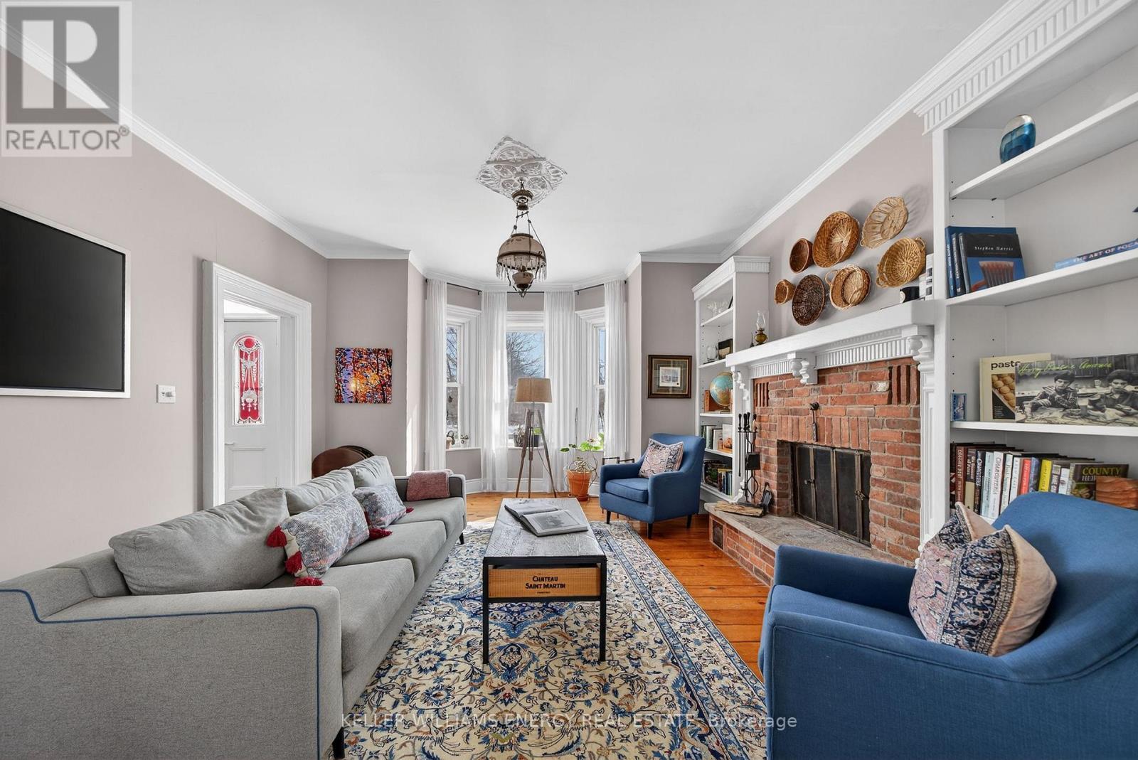 Living room/Family room w/ - 339 Elmbrook Road, Prince Edward County (Sophiasburg Ward), ON - Indoor Photo Showing Living Room With Fireplace