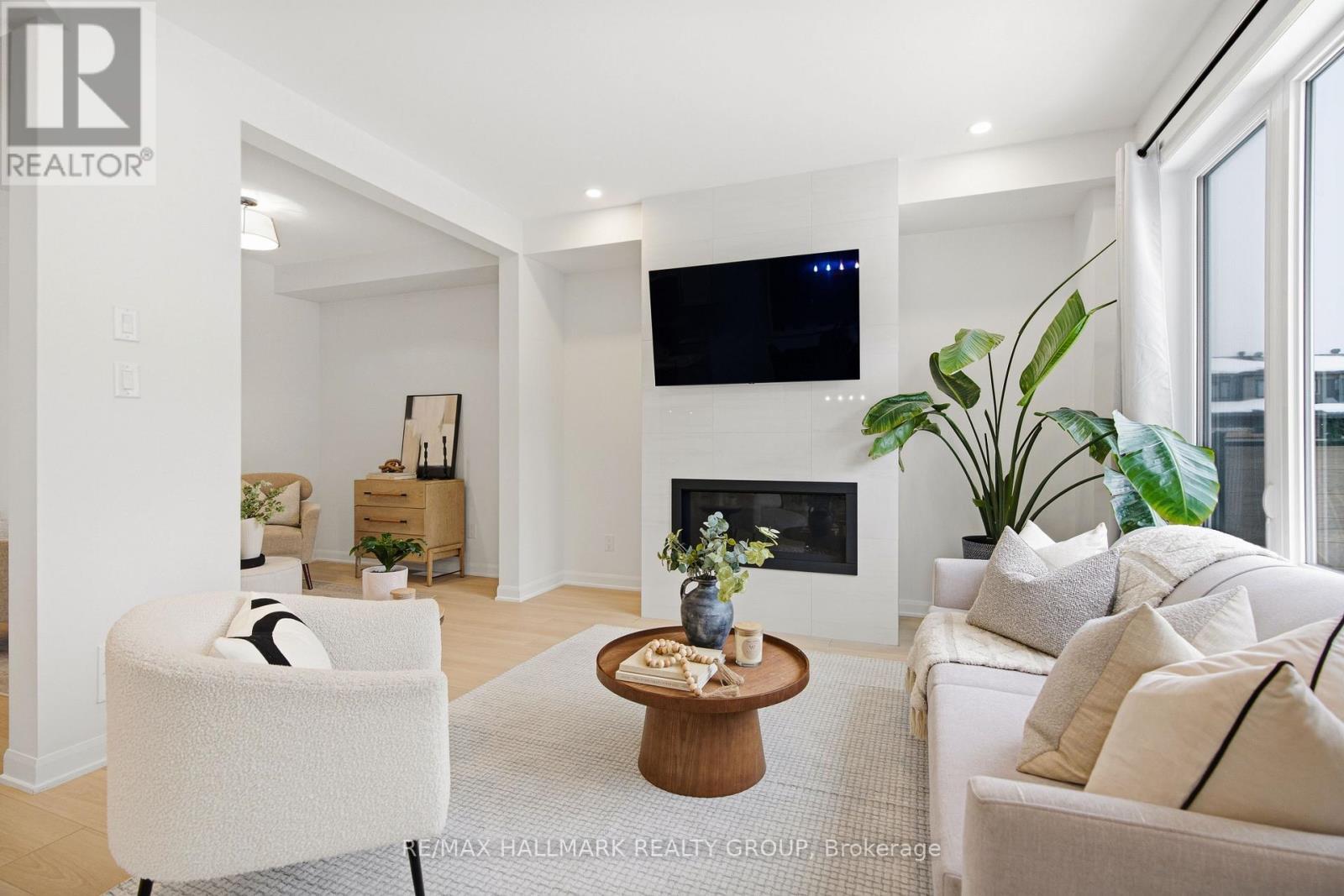 120 Lynn Coulter Street, Ottawa, ON - Indoor Photo Showing Living Room With Fireplace