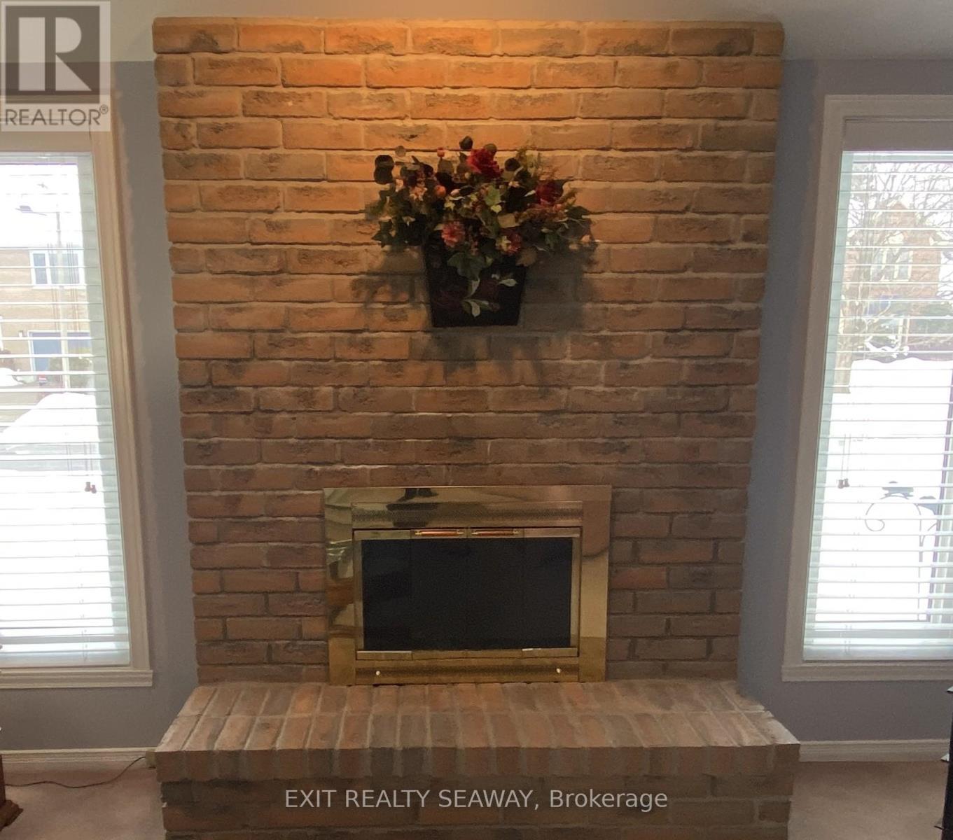 Wood Burning Fireplace - 1638 Blakely Drive, Cornwall, ON - Indoor Photo Showing Other Room With Fireplace