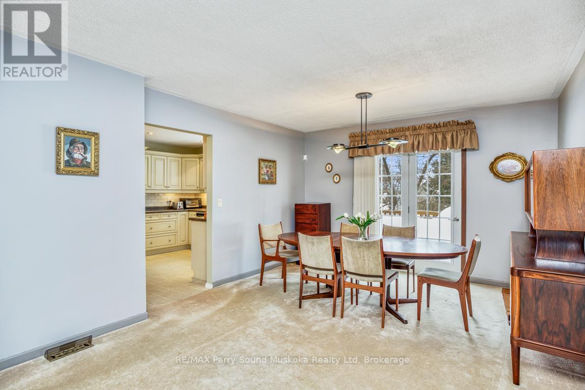 Dining room with walk out to private deck - 2 Laird Drive, Parry Sound, ON - Indoor Photo Showing Dining Room