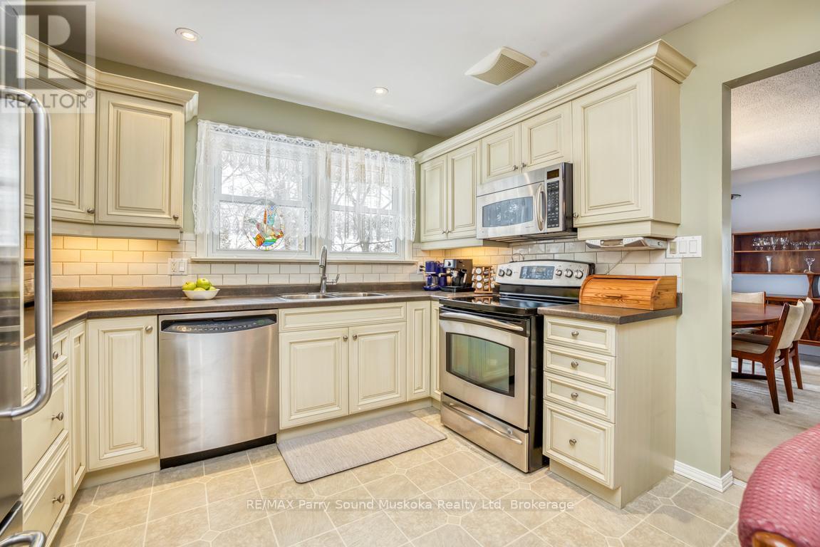 Custom updated kitchen - 2 Laird Drive, Parry Sound, ON - Indoor Photo Showing Kitchen With Double Sink