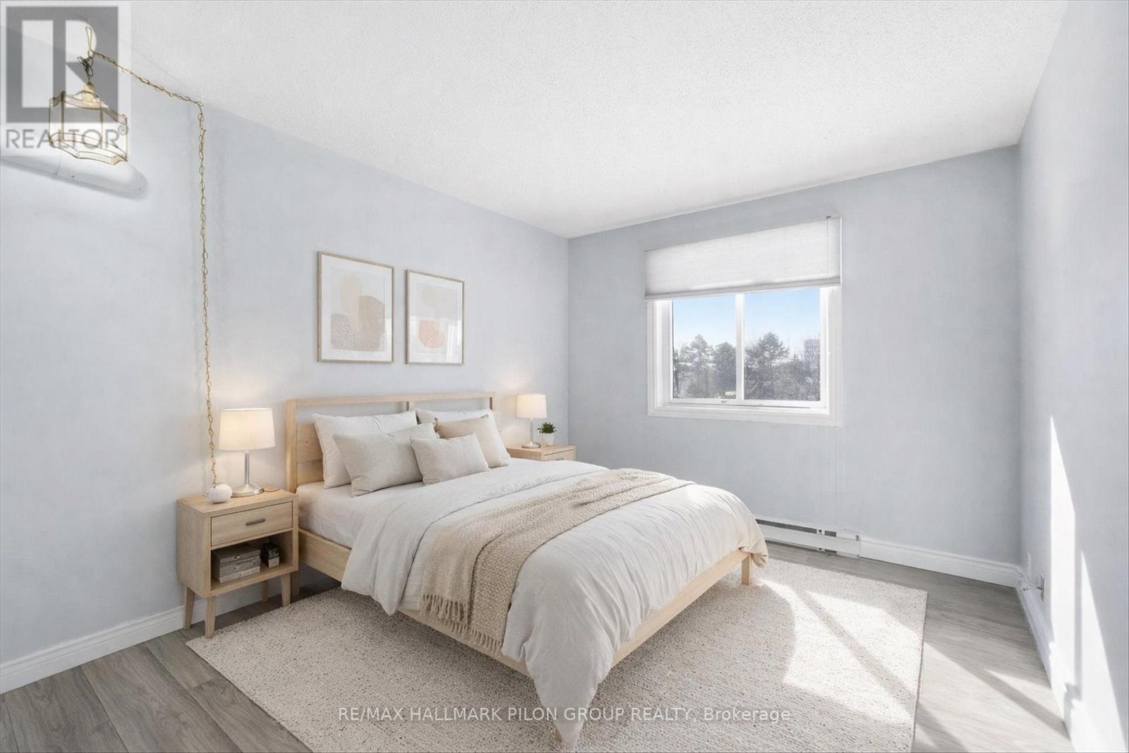 Virtually Staged - 206 - 316 Savard Avenue, Ottawa, ON - Indoor Photo Showing Bedroom