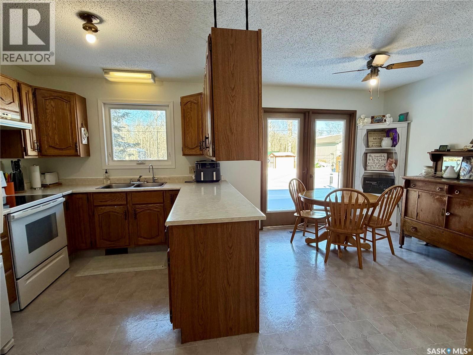 111 Graham Place, Medstead, SK - Indoor Photo Showing Kitchen With Double Sink