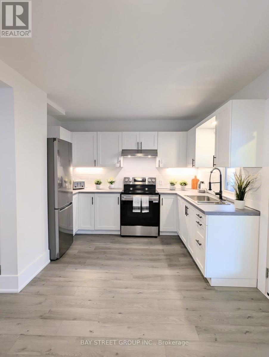 34 Tasker Street, St. Catharines, ON - Indoor Photo Showing Kitchen With Double Sink