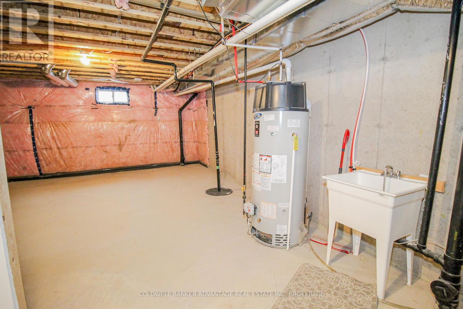 Hot Water Tank & Sump Pump - 77 Keelson Street, Welland (Dain City), ON - Indoor Photo Showing Basement