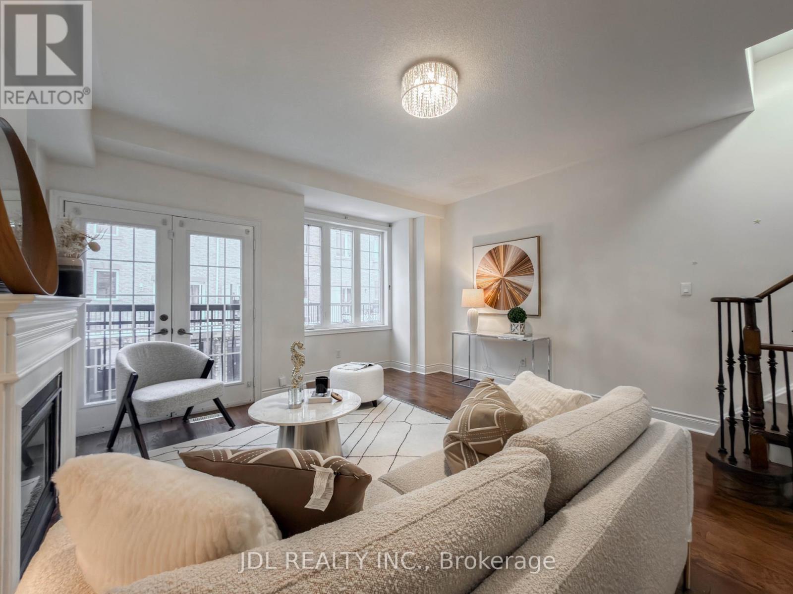 3 Garvin Mews, Toronto, ON - Indoor Photo Showing Living Room With Fireplace