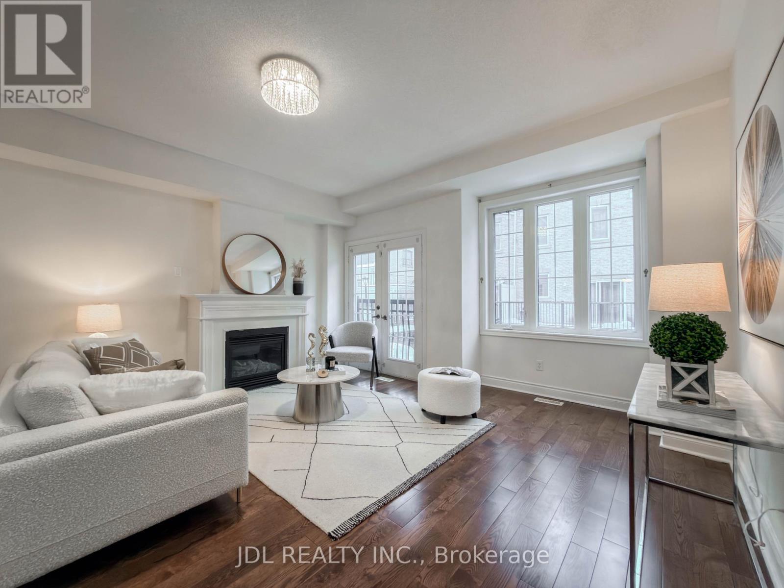 3 Garvin Mews, Toronto, ON - Indoor Photo Showing Living Room With Fireplace