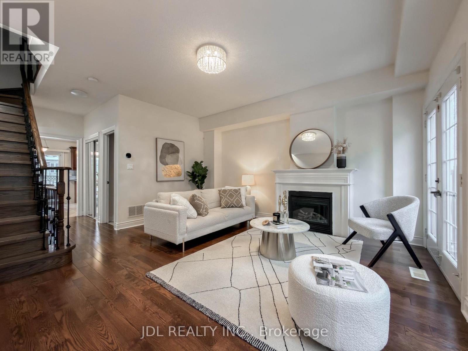 3 Garvin Mews, Toronto, ON - Indoor Photo Showing Living Room With Fireplace
