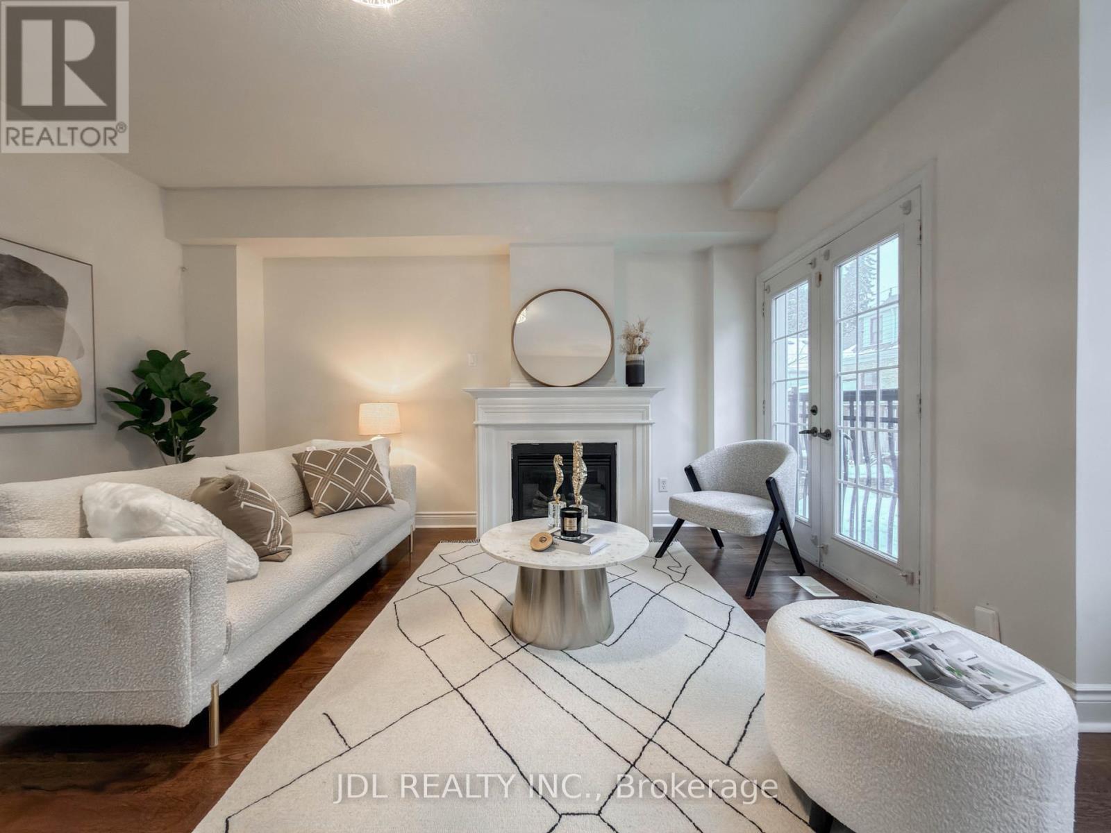 3 Garvin Mews, Toronto, ON - Indoor Photo Showing Living Room With Fireplace