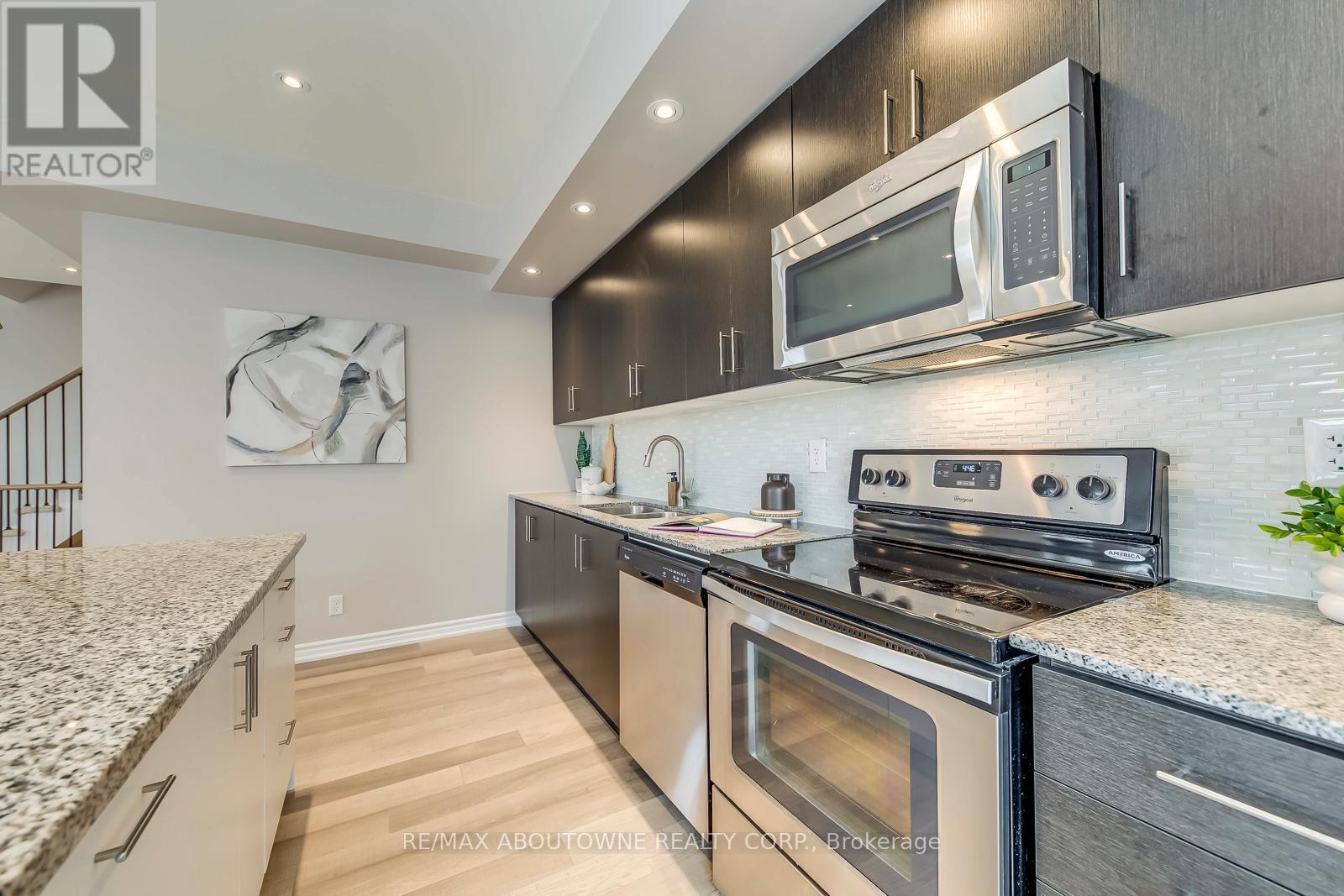 107 - 40 Carnation Avenue, Toronto, ON - Indoor Photo Showing Kitchen With Upgraded Kitchen