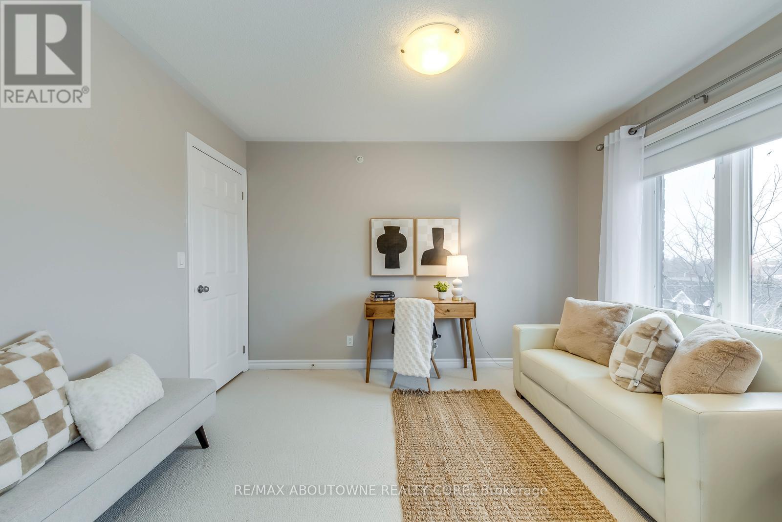 107 - 40 Carnation Avenue, Toronto, ON - Indoor Photo Showing Living Room