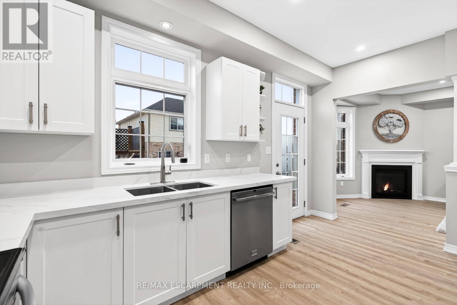 8 Bousfield Court, Hamilton, ON - Indoor Photo Showing Kitchen With Fireplace With Double Sink