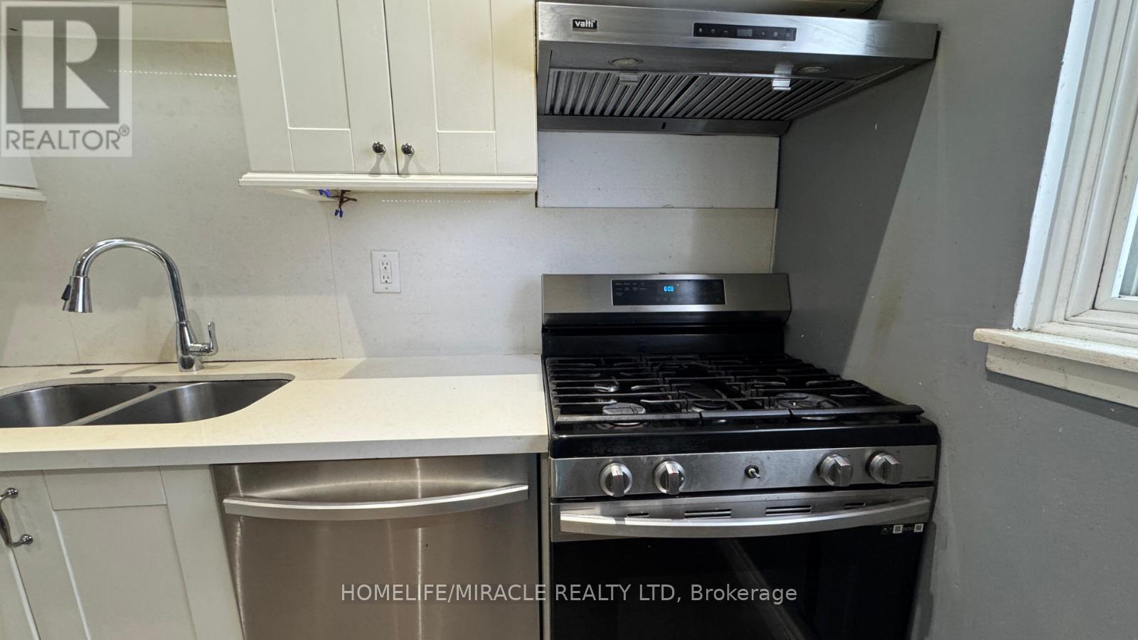 61 Moregate Crescent, Brampton, ON - Indoor Photo Showing Kitchen With Double Sink