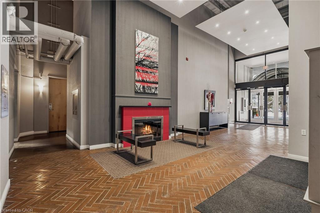 66 Bay Street S Unit# 504, Hamilton, ON - Indoor Photo Showing Other Room With Fireplace