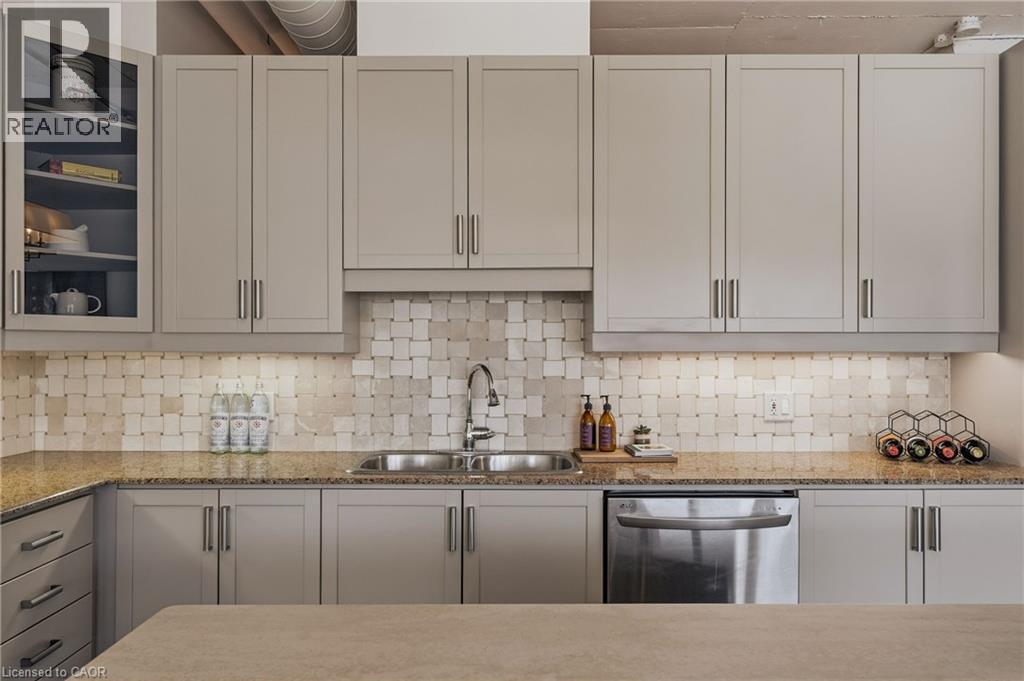 66 Bay Street S Unit# 504, Hamilton, ON - Indoor Photo Showing Kitchen With Double Sink